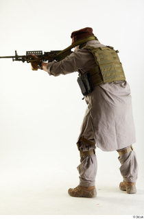 Photos Luis Donovan Army Taliban Gunner Poses aiming gun standing…